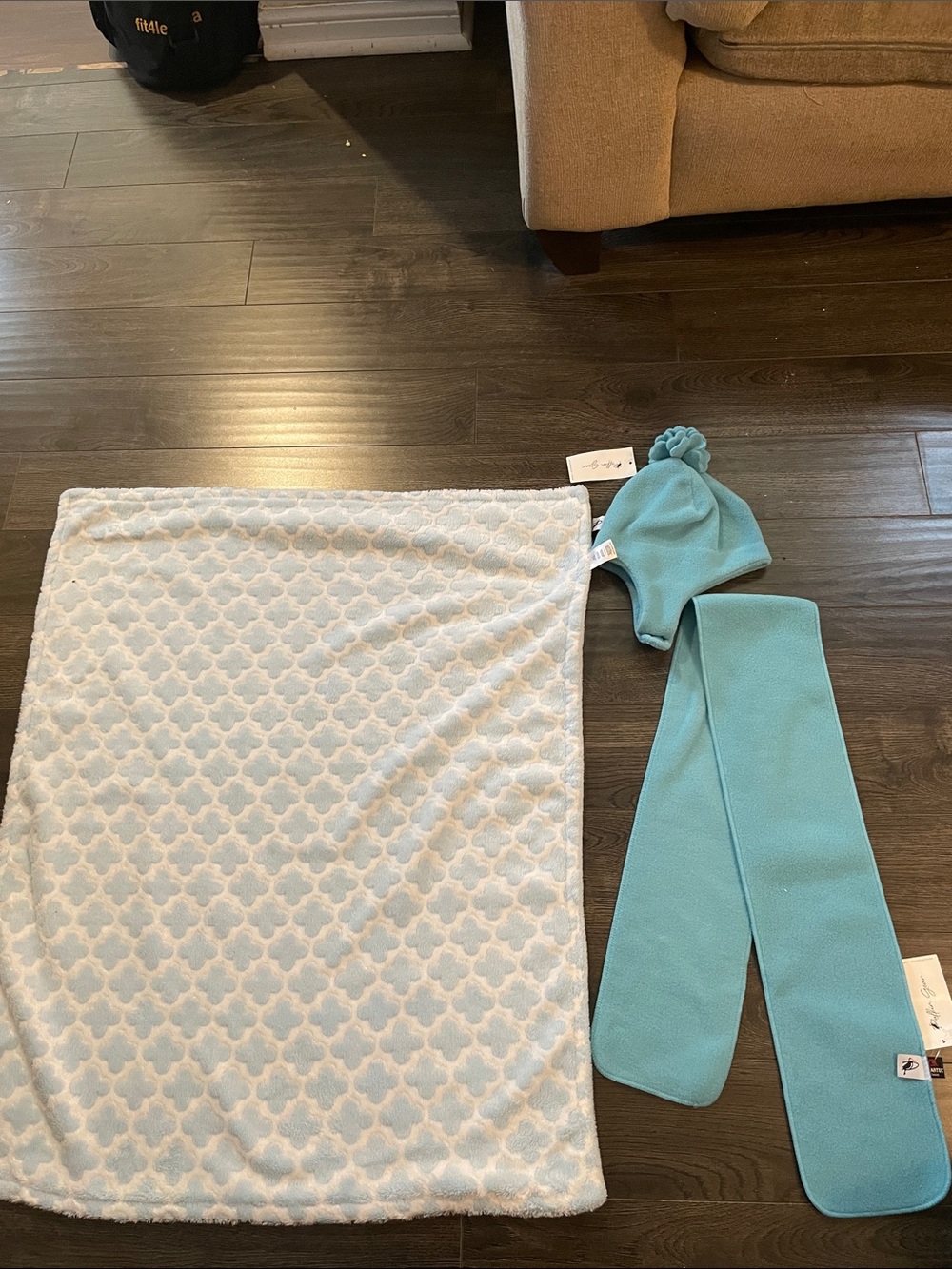 Hat with scarf set and blue and white blanket